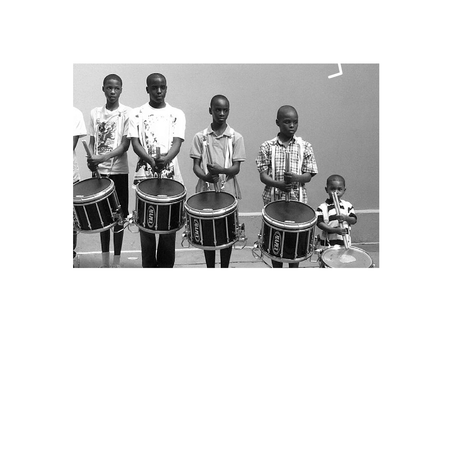 students with drums with a quote from John Daddario Jr